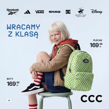 Dziecko na niebieskim tle.